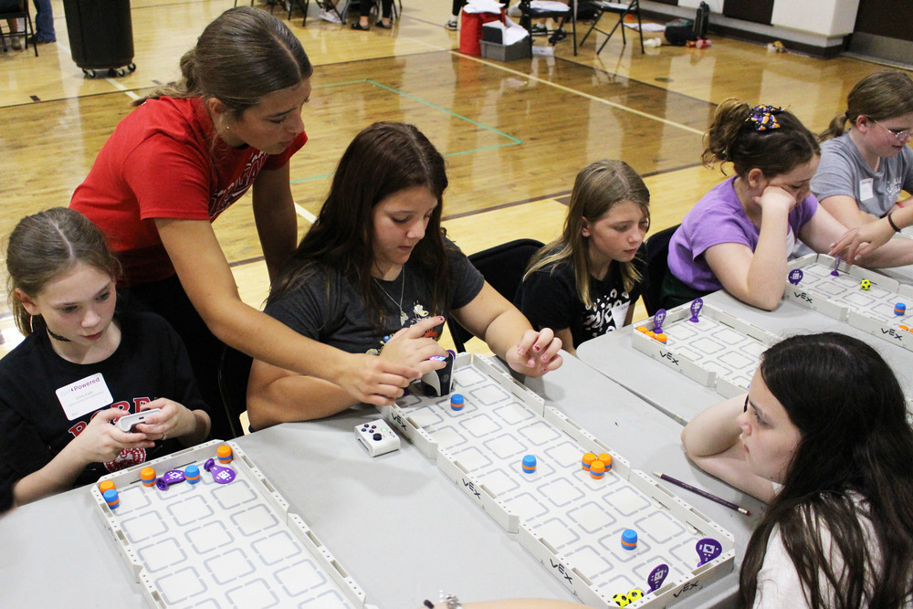 Students participate in hands-on activities at the Girl Powered STEM Workshop.