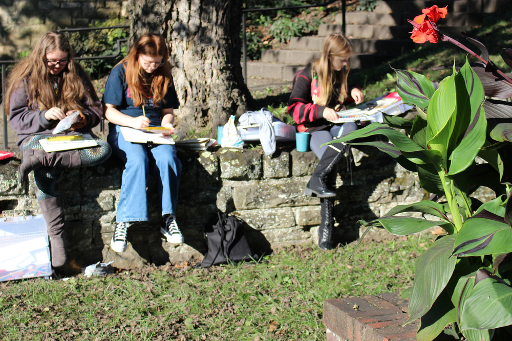 Students paint the scenery at Oglebay Park Resort.