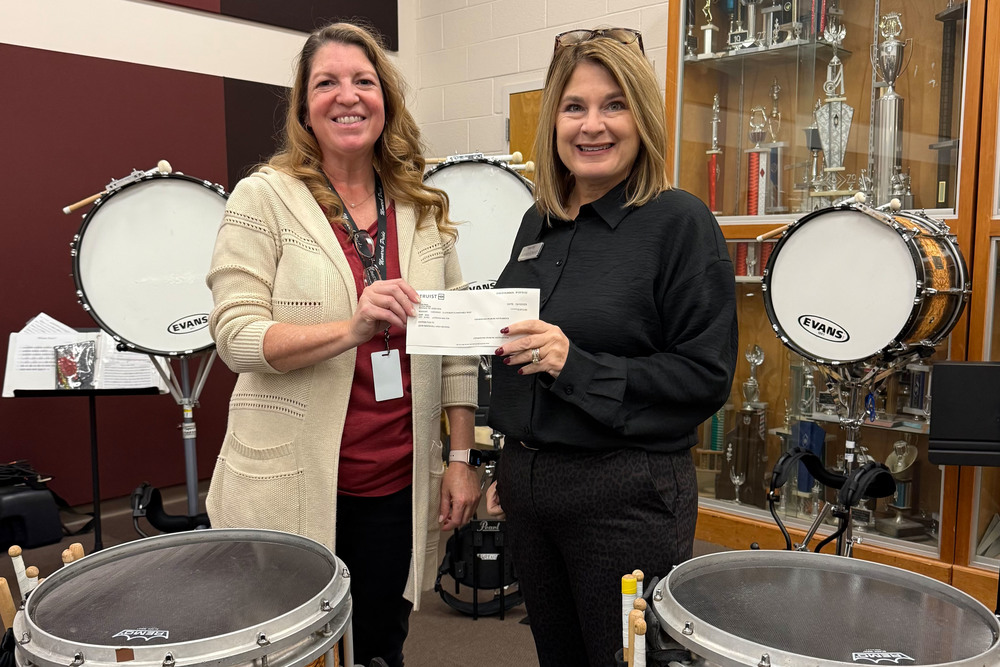 Pictured from left: Tracey Filben, JMHS Band Director, and Leigh Ann Scherich, SVP Truist.