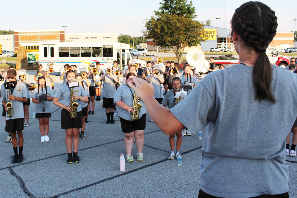 The JM Marching Monarchs perform at Quaker Steak & Lube.