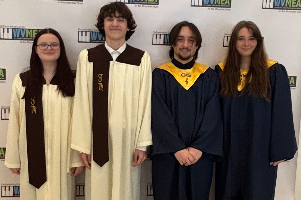 Pictured from left: John Marshall High School students Allison Ryan and Landon Potts and Cameron High School students Jesse Richmond and Kennedi Lilley represented Marshall County Schools as members of the WVMEA All-State High School Chorus at the 80th annual West Virginia Music Educators Association In-Service Conference in Charleston. David Scherrick is the JMHS Chorus Director and Keenan Seditz is the Director of Vocal Music at CHS.