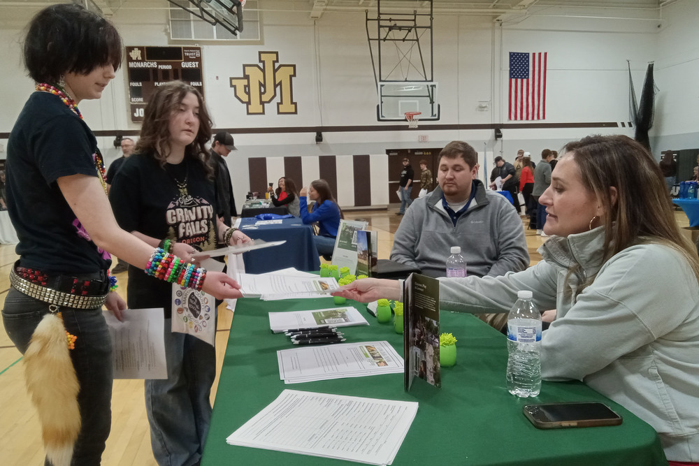 Students talking to industry leaders at the Marshall County CTE Fair.