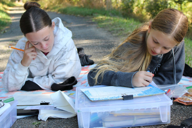 Students paint the scenery at Oglebay Park Resort.