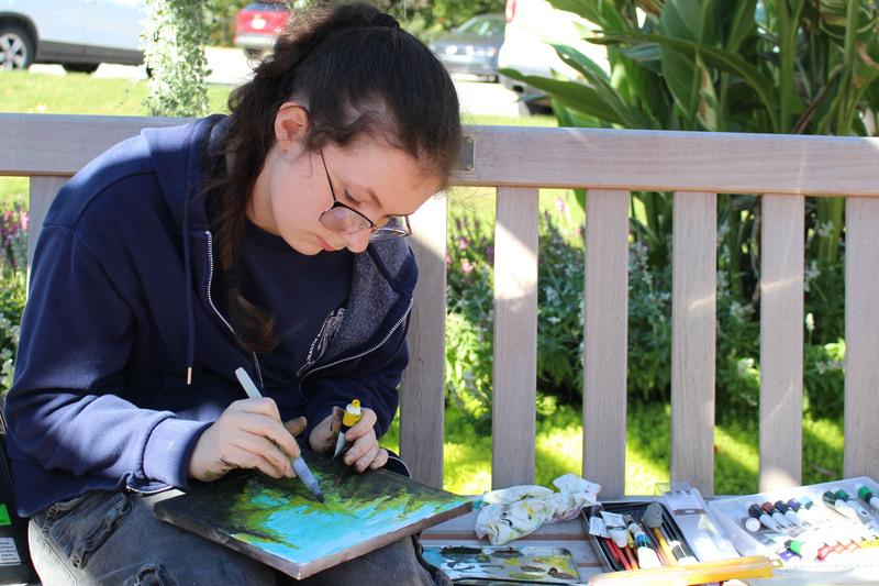 Students paint the scenery at Oglebay Park Resort.
