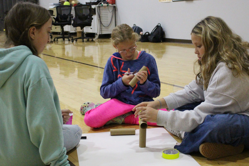 Students participate in hands-on activities at the Girl Powered STEM Workshop.