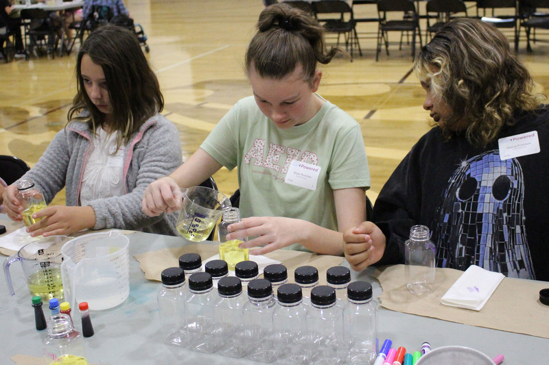 Students participate in hands-on activities at the Girl Powered STEM Workshop.