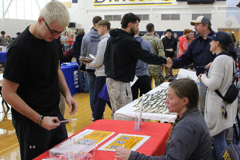 Students talk to a representative at the CHS College & Career Fair.