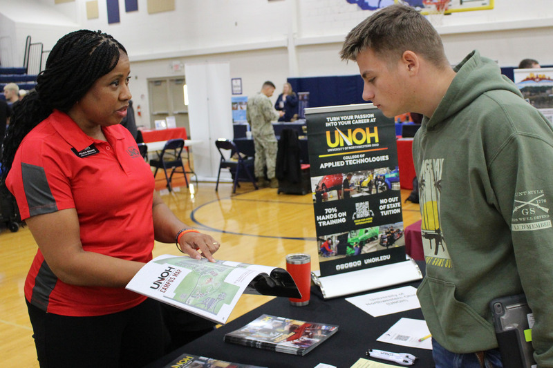 Students talk to a representative at the CHS College & Career Fair.