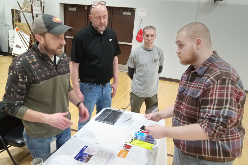 Students talking to industry leaders at the Marshall County CTE Fair.
