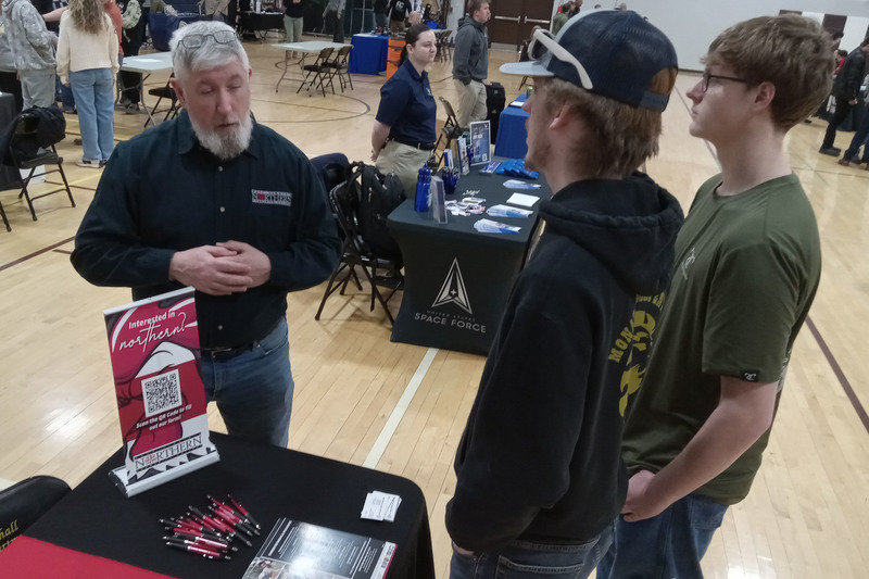 Students talking to industry leaders at the Marshall County CTE Fair.