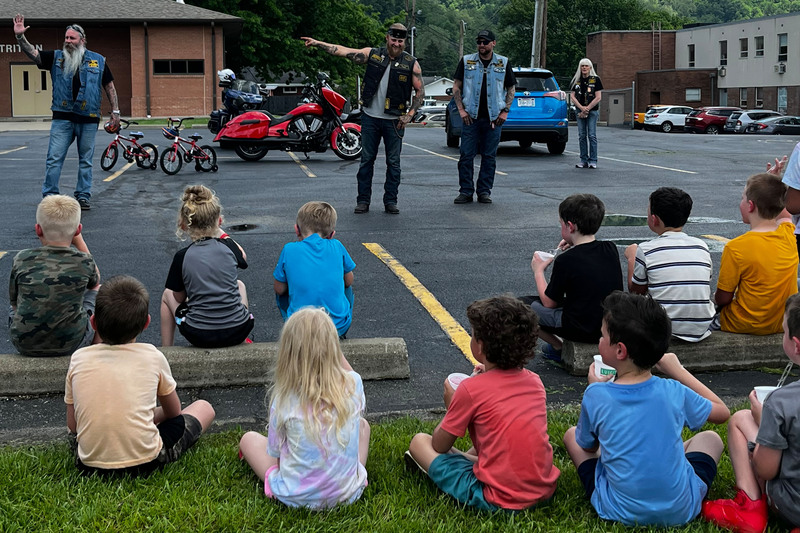 Students with new bikes.