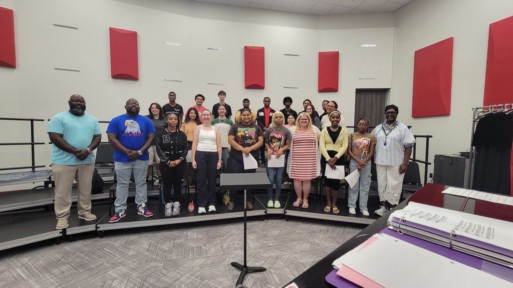 Woodlawn High School and Marshall High School Choirs Rehearsing for the Radiance Technologies Independence Bowl Appreciation Dinner