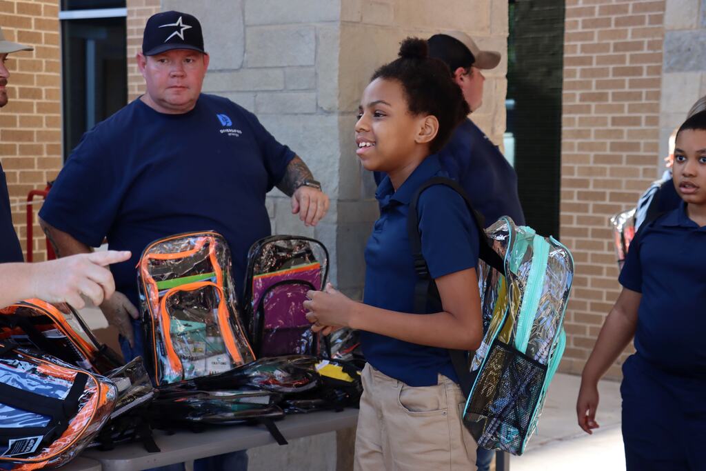 William B. Travis & Diversified Energy Backpack Donation