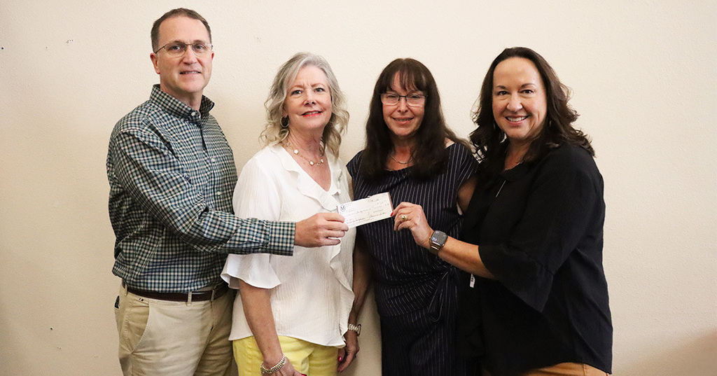 Class of 76' Check Donation for Benches