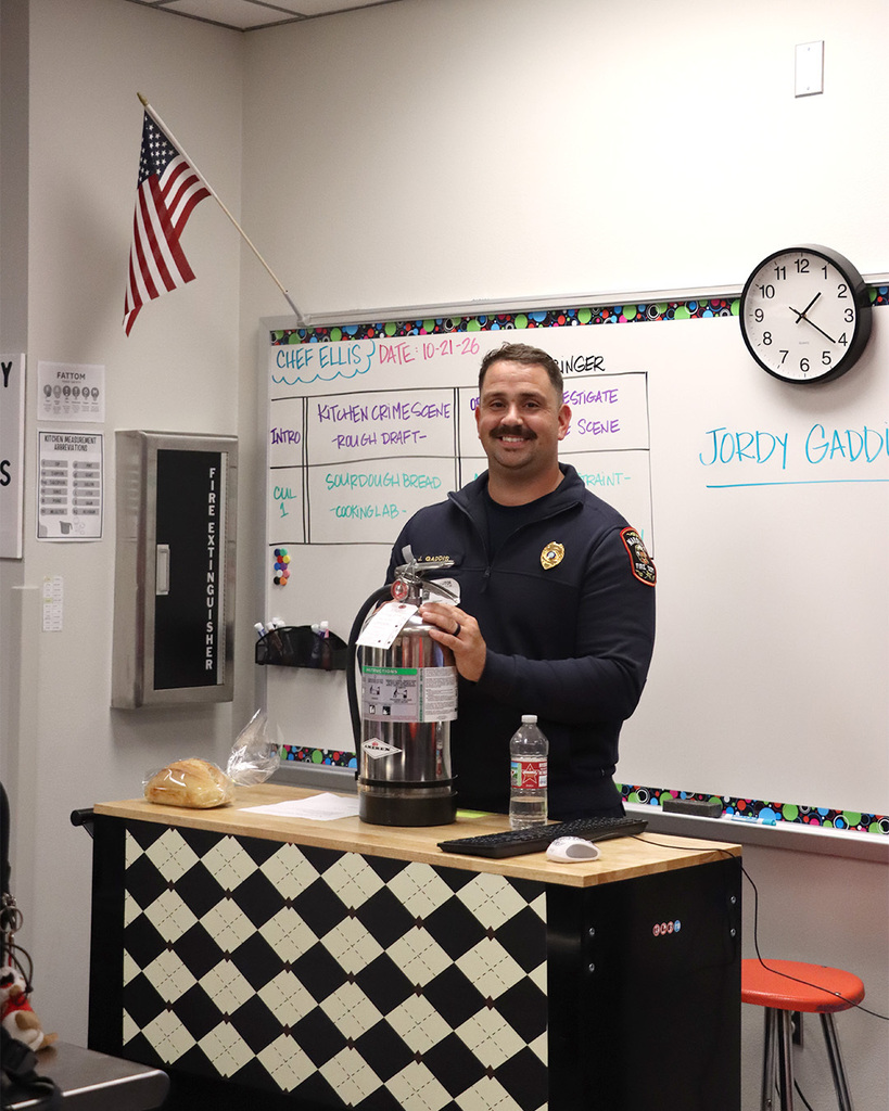 Captain Gaddis, with the Marshall Fire Department teaching our Culinary Arts students about fire safety in the kitchen.