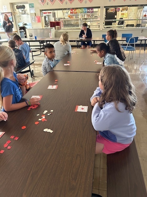 students sitting at table