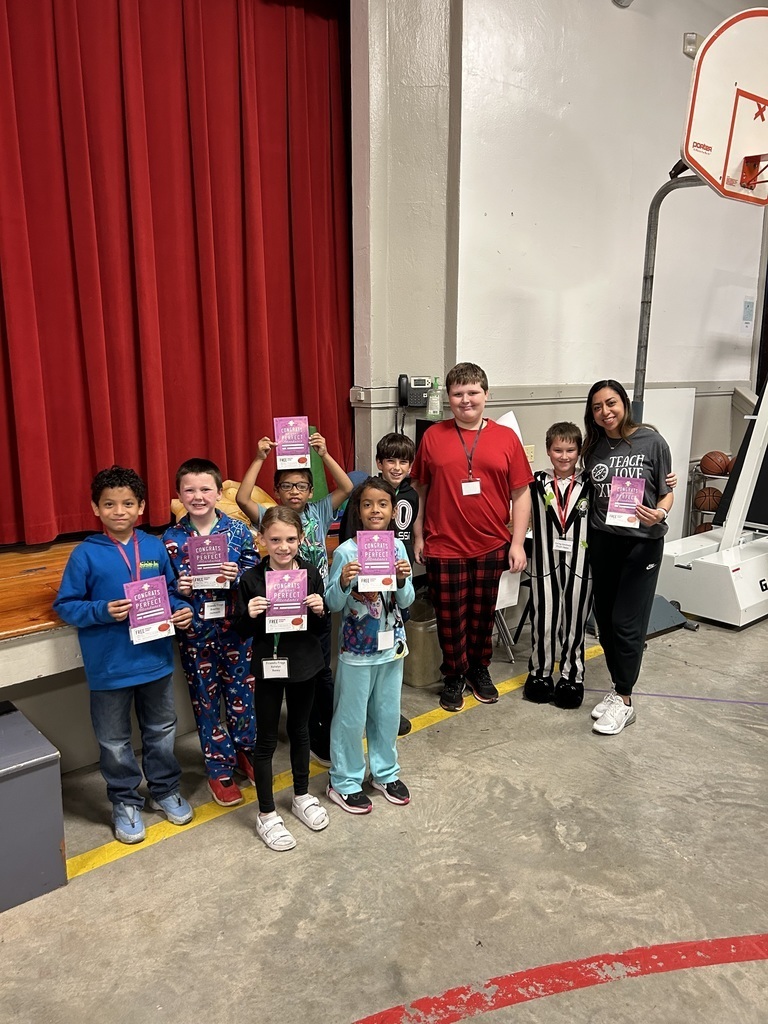 students holding awards