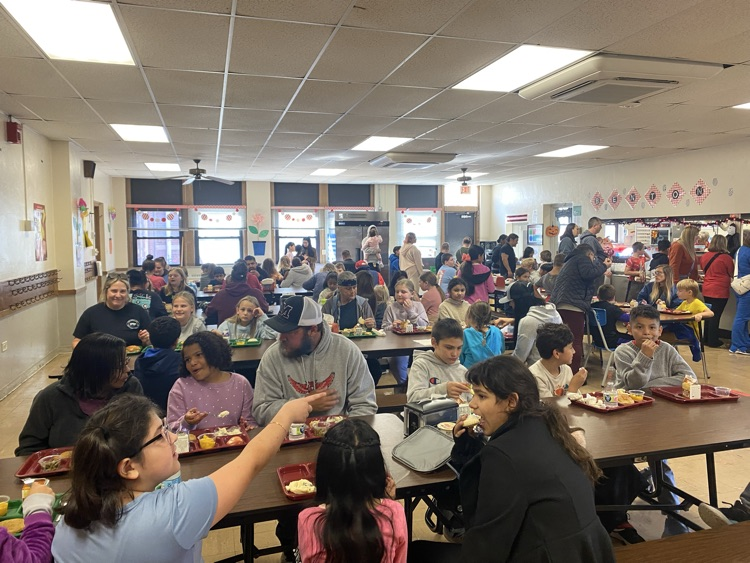 people sitting at cafeteria  tables