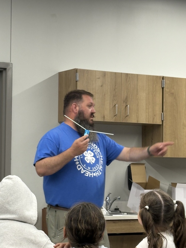 adult male directing a class