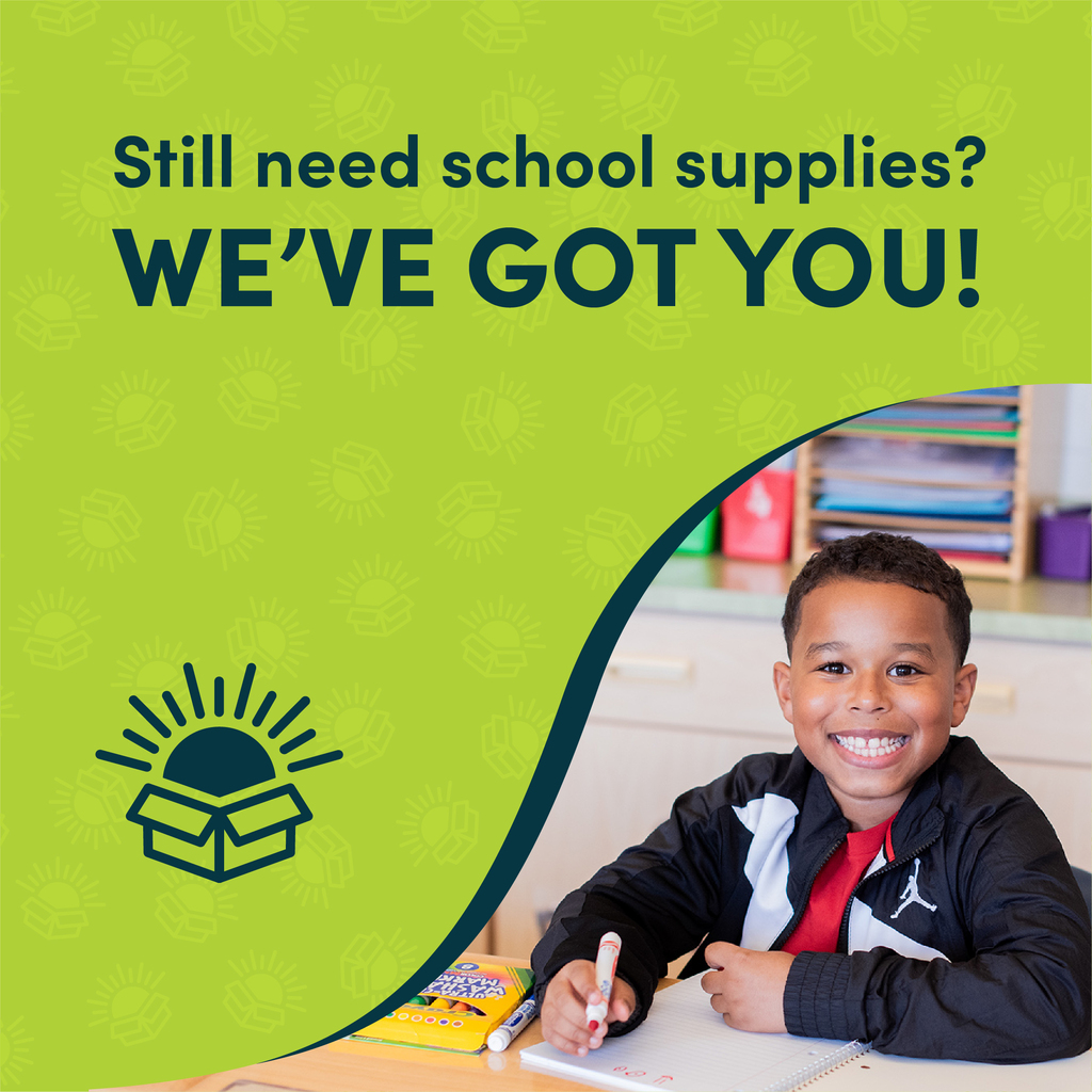 Still need school supplies? We've got you with kid smiling at camera.