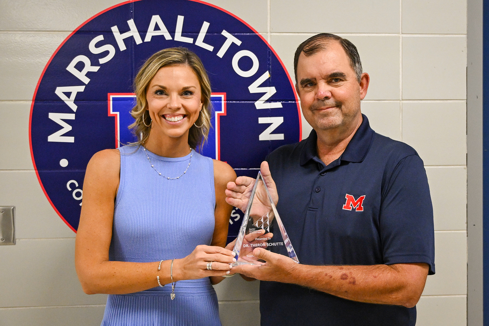 Theron Schutte receiving award