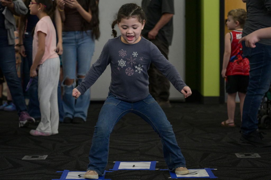 Student doing hop scotch