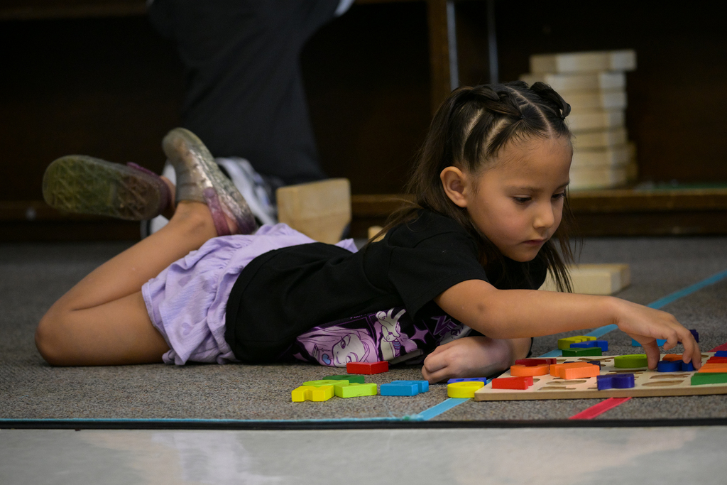 Preschool student playing
