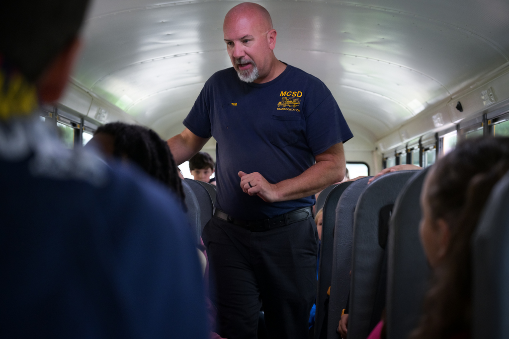 Transportation department employee giving instructions