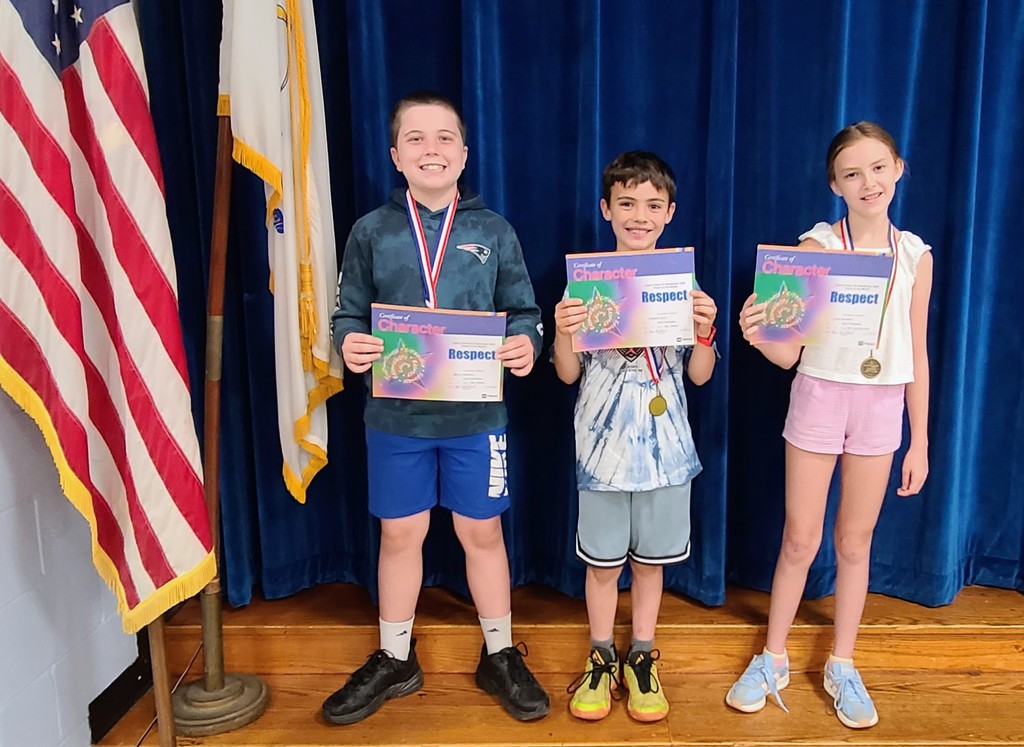 Children holding certificates