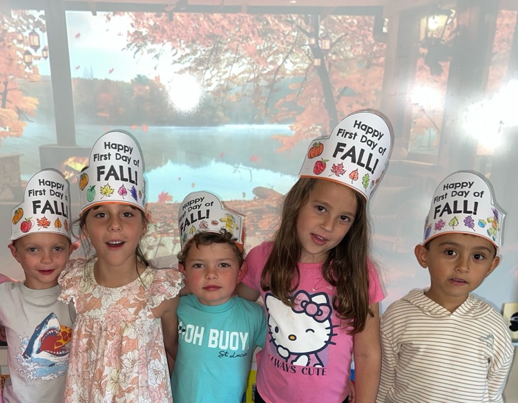 students wearing “Happy Fall Y’all” hats