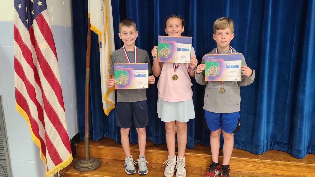 Students holding certificates