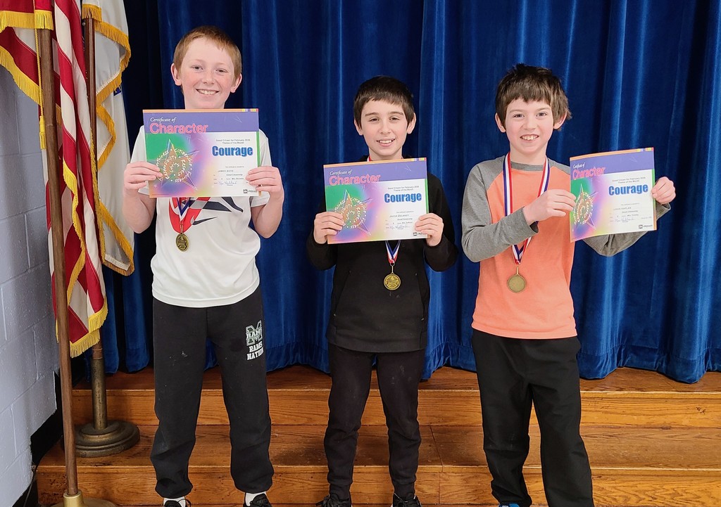 Students holding certificates