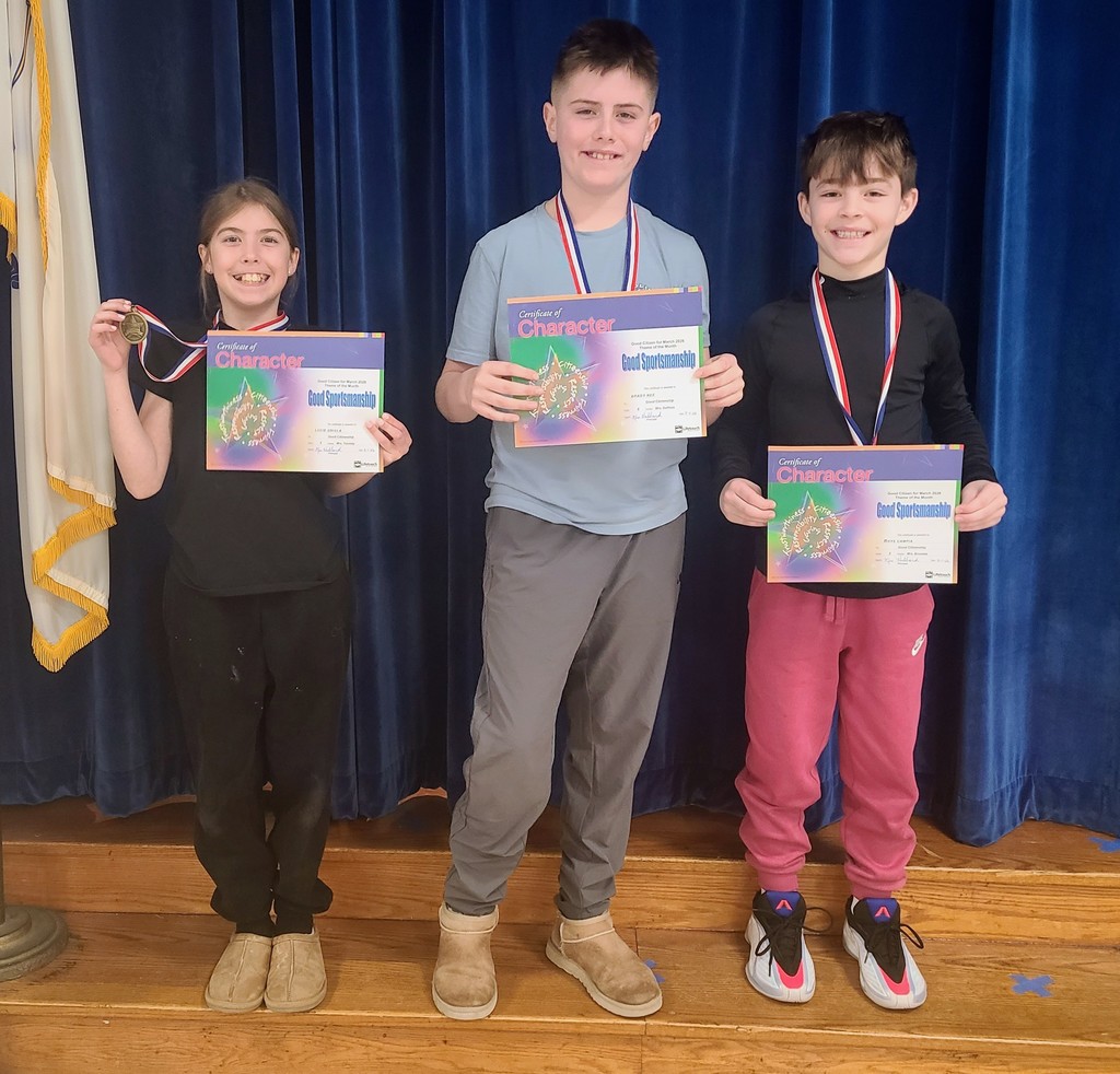 Students holding certificates