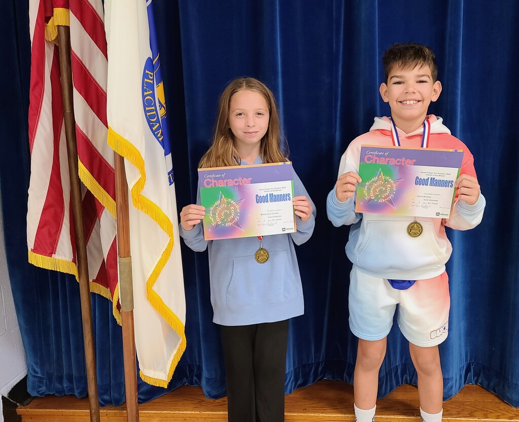 Students holding award certificates