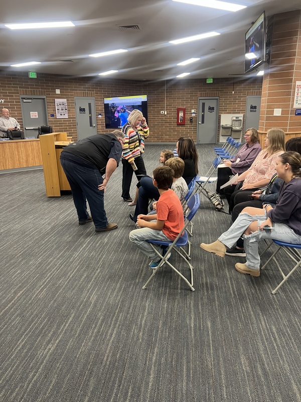 Chairman Sevy speaking with students