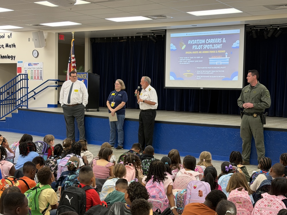 Local aviation professionals speaking at J.D. Parker's National Aviation Day Assembly