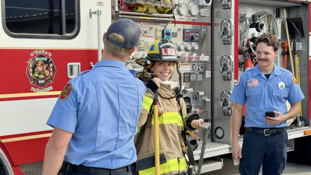 Emergency Medical Responder Student from MCHS tries on firefighter gear at Martin County Fire Rescue Station 23 