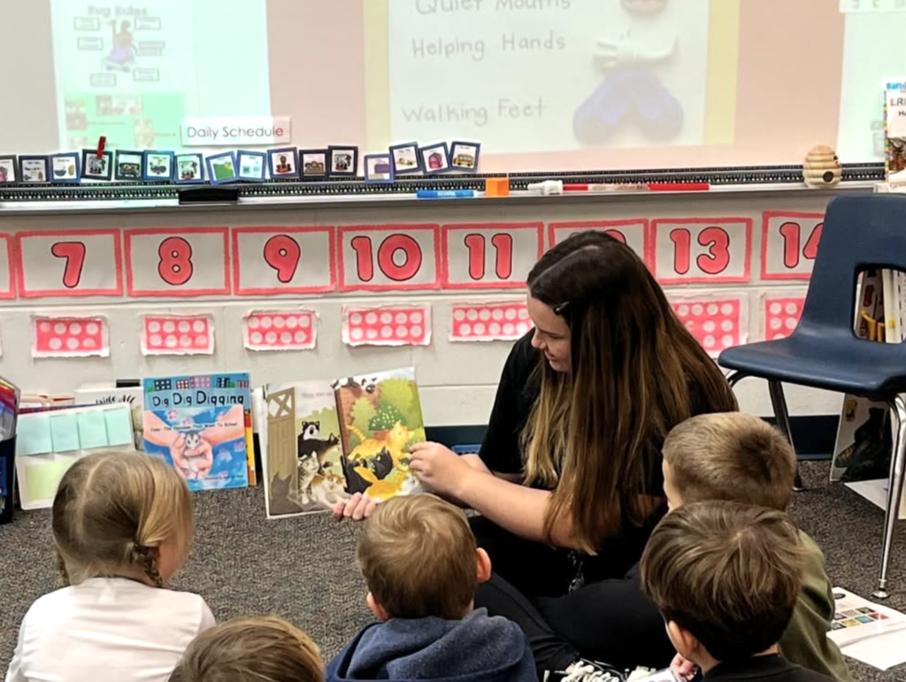 JBHS students visit FAWE to read to students