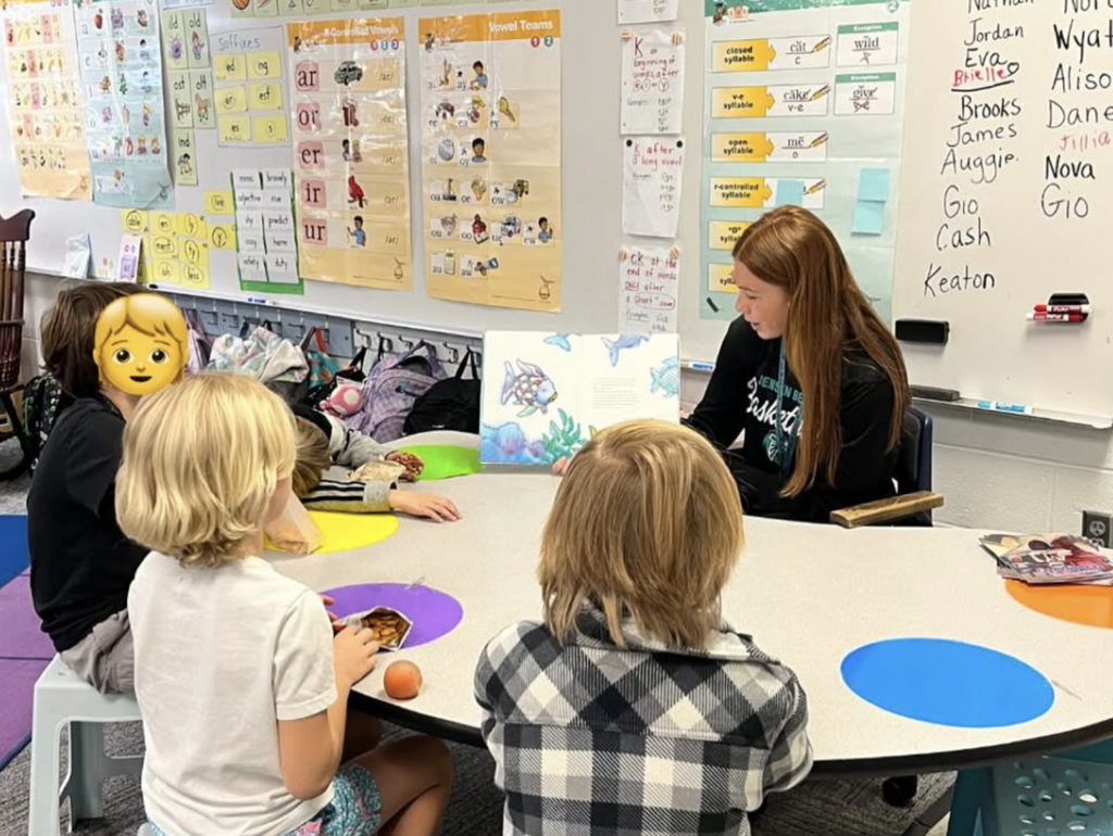 JBHS students visit FAWE to read to students