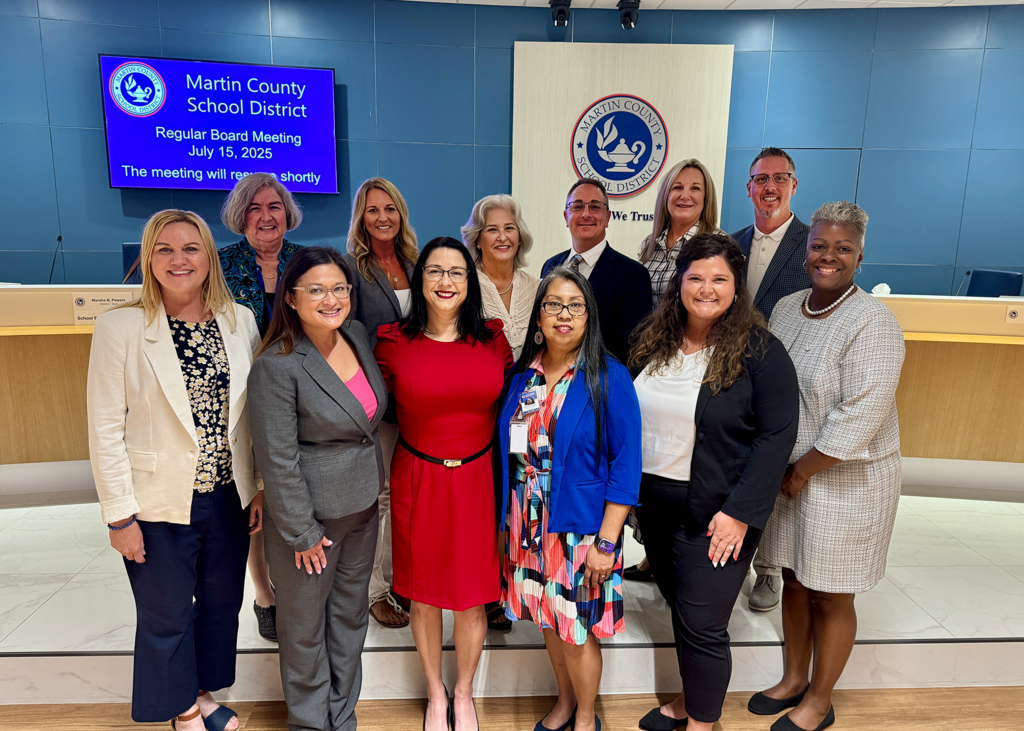 Celebrating new leaders during the school board meeting on July 15