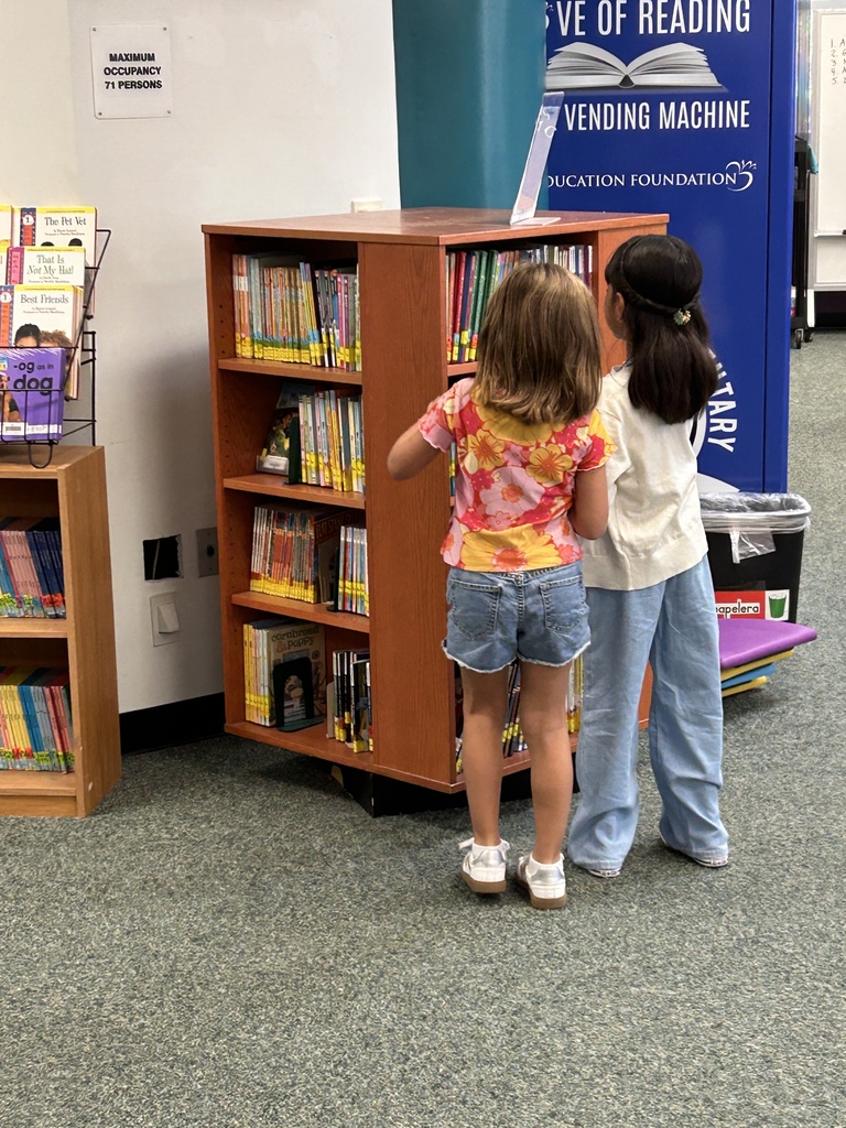 Girls looking at the early chapter books