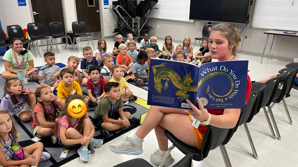 Alanna Gilbride reading to Extended Day littles