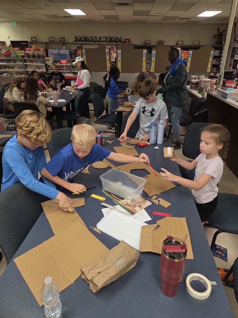 Practicing our cardboard skills!