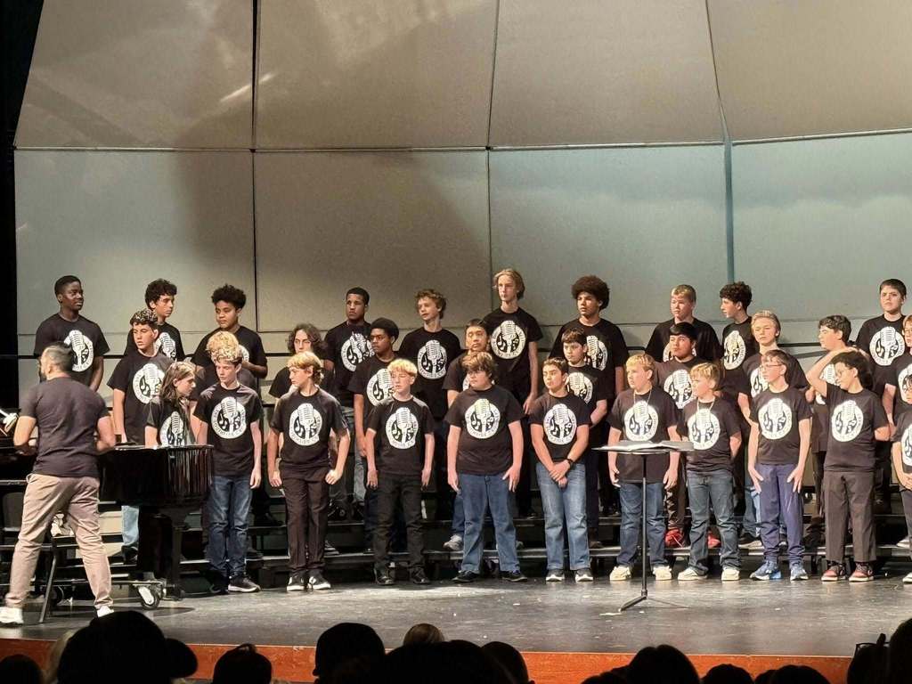 Shark boys choir attend and perform at Mens Day