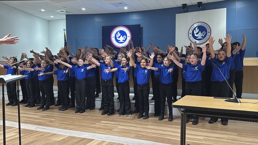 FAWE Sailfish Singers at school board meeting