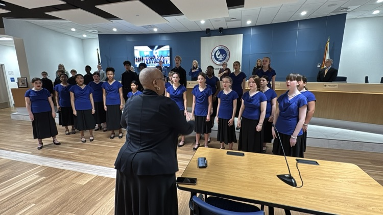 MMS choir performs at school board meeting