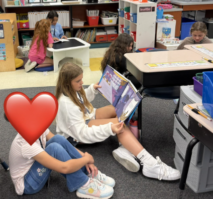 2026 Literacy Week - Ms. Cagni's fourth grade reading with Ms. Thompson's first grade 3