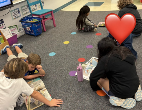 2026 Literacy Week - Ms. Cagni's fourth grade reading with Ms. Thompson's first grade 2