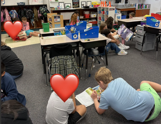 2026 Literacy Week - Ms. Cagni's fourth grade reading with Ms. Thompson's first grade 5