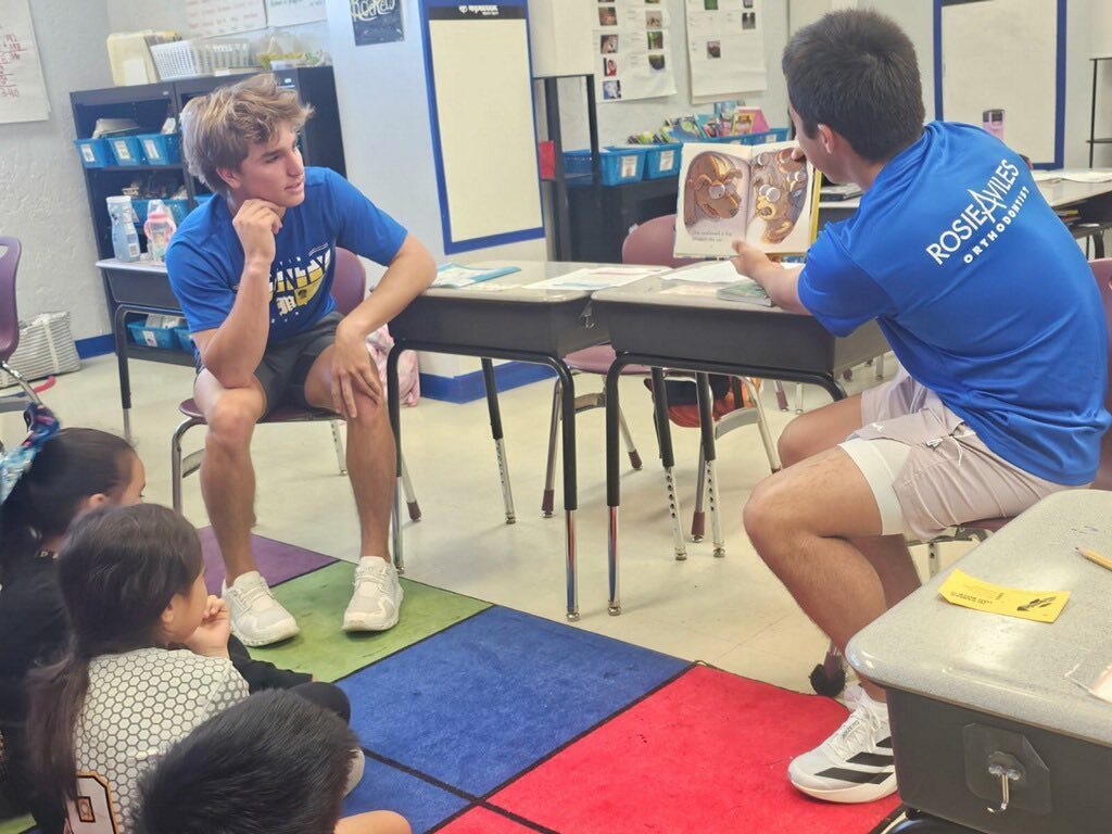 MCHS baseball players read to JDP students
